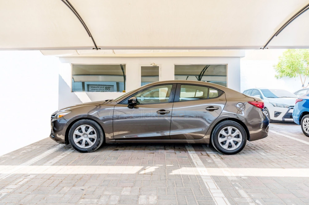 Bronze Mazda 3 Sedan 2019 for rent in Dubai 4